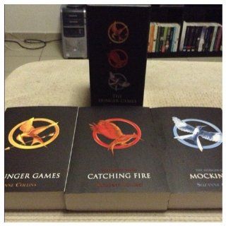 The Hunger Games Trilogy Boxset: Suzanne Collins: 9780545626385: Books