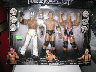 WWE DELUXE AGGRESSION EXCLUSIVE KB  REY MYSTERIO/RANDY ORTON/KURT ANGLE: Toys & Games