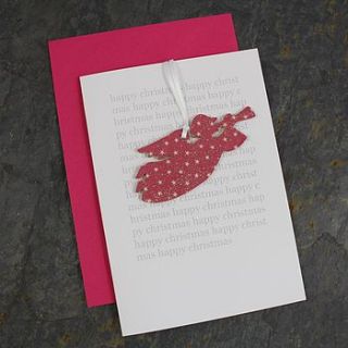 christmas card and angel decoration by nest