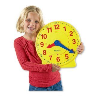 Learning Resources Changing Faces Clock: Toys & Games