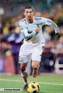 Cristiano Ronaldo kicking up turf POSTER 23.5 x 34 Portugal soccer football star playing for Real Madrid (sent FROM USA in PVC pipe) : Prints : Everything Else