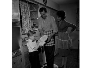 Parents and son washing dishes Poster Print (18 x 24)
