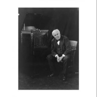 Thomas Edison, seated beside phonograph Poster Print (12 x 16)